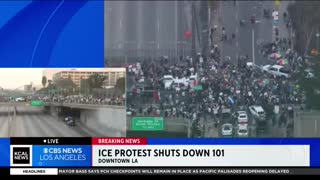 Anti-ICE protesters flood 101 Freeway in downtown Los Angeles