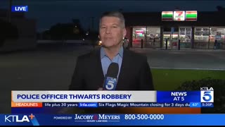 Video captures officer walking into 7-Eleven during armed robbery