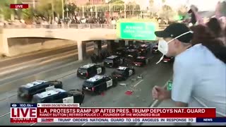 Anti-ICE protesters throw rocks at California law enforcement vehicles on freeway in Los Angeles